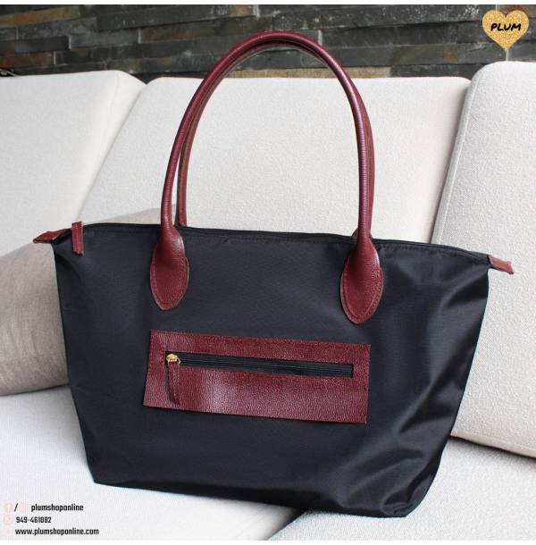 Black leather and nylon handbags Noa