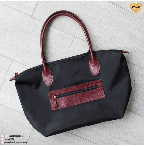 Black leather and nylon handbags Noa